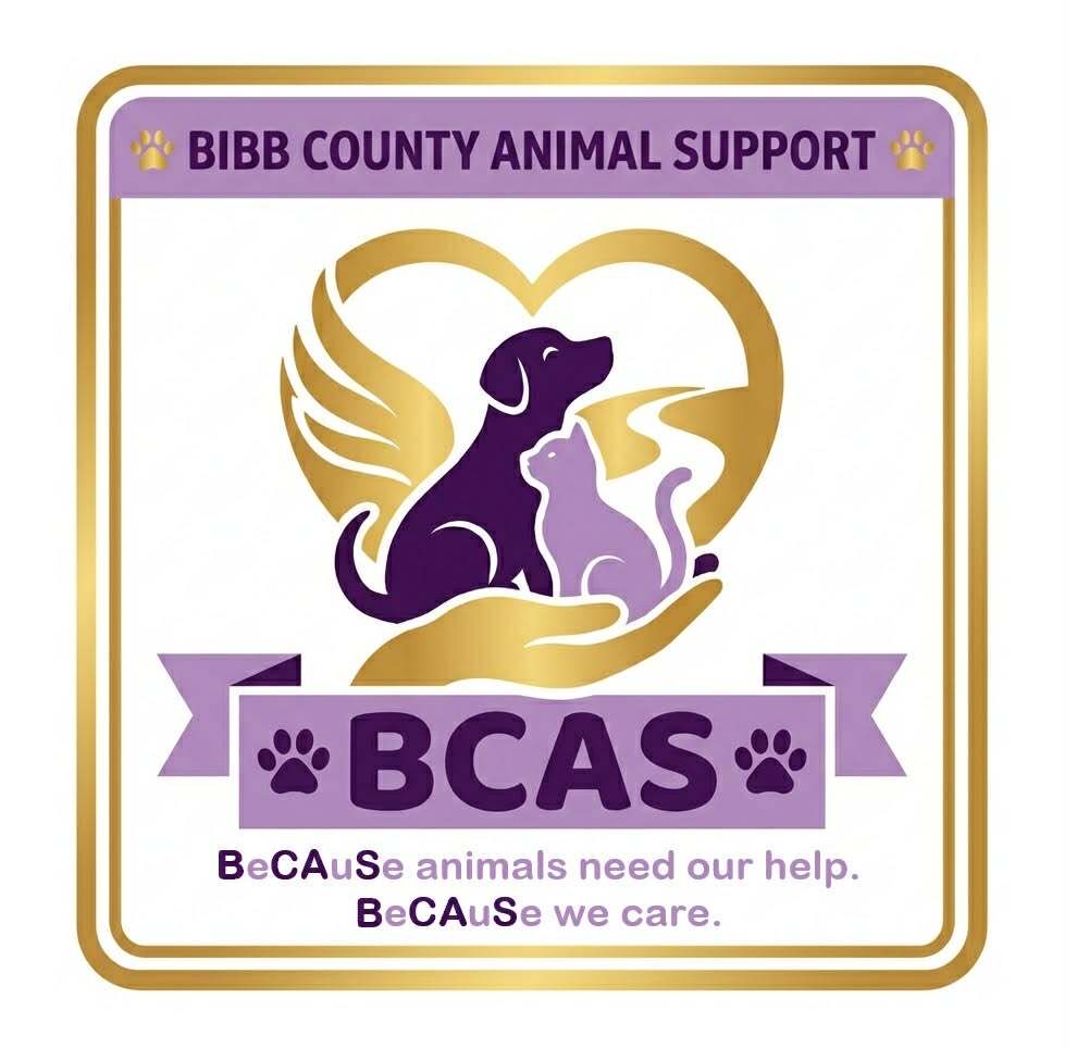 The Bibb County Animal Support logo: a dog and cat held in a golden hand inside a winged heart, above the motto "BeCAuSe animals need our help. BeCAuSe we care."